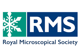 Why are LED microscope illuminators ideal for multi-user facilities?